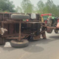 garbage-tractor-overturns-injures-two-sanitation-workers